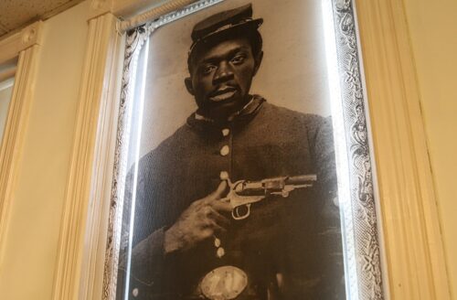 Window covering at Arlington Historical Museum honors Sgt. Nimrod Burke of the 23rd US Colored Infantry (Scott McCaffrey)
