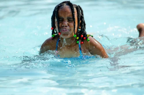 steward-masweneng-Pyj9sYz8m0Y-unsplash-scaled Black kids ages 10-14 are more likely to drown in public pools at rates 7.6 times higher than white children, according to CDC data. (Steward Masweneng/Unsplas)