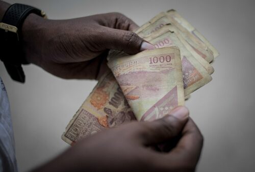 2013_10_23_Economy_Barclays_Remittance_Money_Transfer_014_(10471017373) Millions of people in Africa Somalia rely on money sent from their relatives and friends abroad in the form of remittances in order to survive. (AMISOM Public Information, CC0, via Wikimedia Commons)