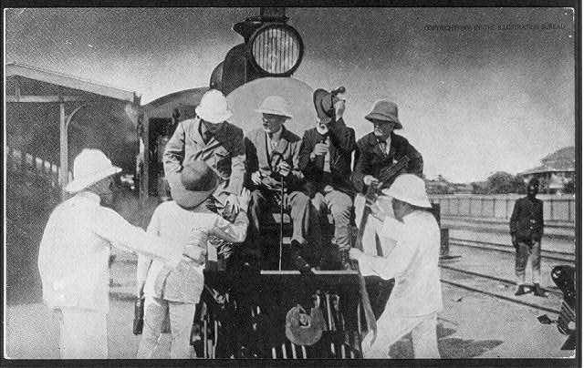 Theodore Roosevelt in front of a train in Ugana