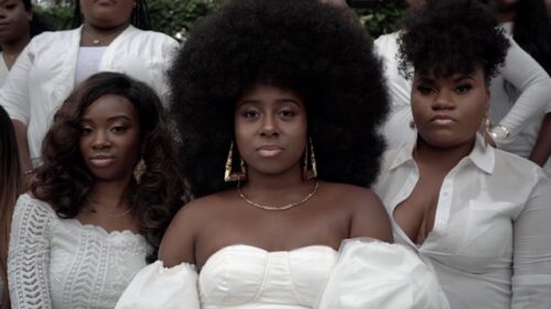 topsphere-media-rWxMfj9y0F4-unsplash Black women in white outfits