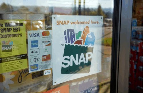 ABHM6 A “SNAP welcomed here” sign is seen at the entrance to a Big Lots store in Portland, Oregon.. Getty Images.