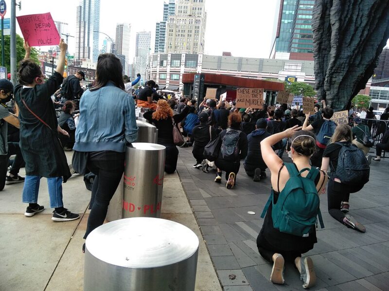 Protestors kneeling from behind at George Floyd protest