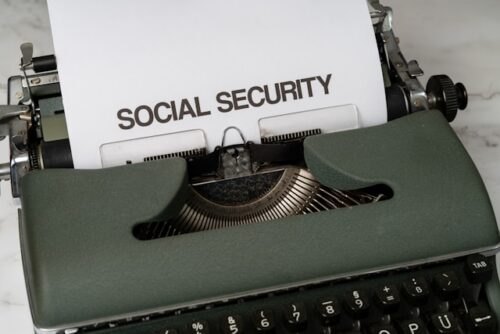 markus-winkler-HwEwAYr0d7w-unsplash Typewriter containing a sheet of paper reading "Social Security"